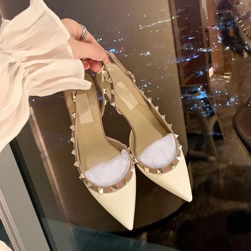 Rivet high heels women's thin heels pointed toe nude single shoes summer new side empty willow sandals women's outer wear