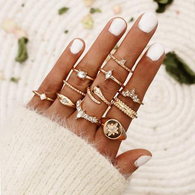 Bohemien Creativo Goccia Personalità Complessa Tendenza Occhio Nero Serpente Stella Perla Set da 11 Pezzi Anello