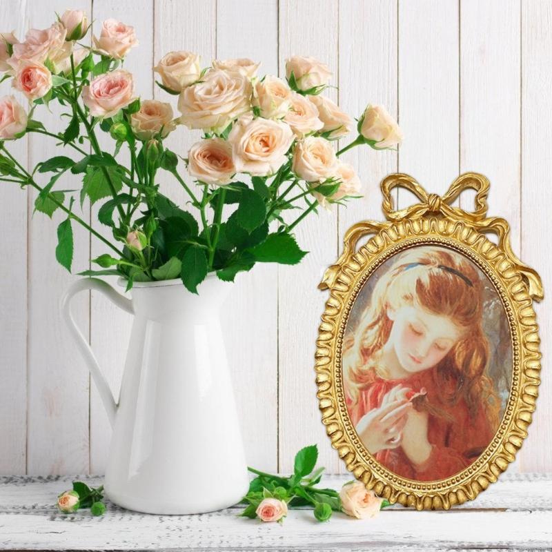 Handcrafted Antique Gold Carving Oval Bowknot Picture Frame With Hanging Hook And Stand For Wall Or Desktop Decoration
