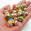 DIY Schmuckzubehör Blumenglocken Hohlglocken Cloisonné-Glocken Tropfölfarbene Haustierglocken Blumenkugel Eisenglocken