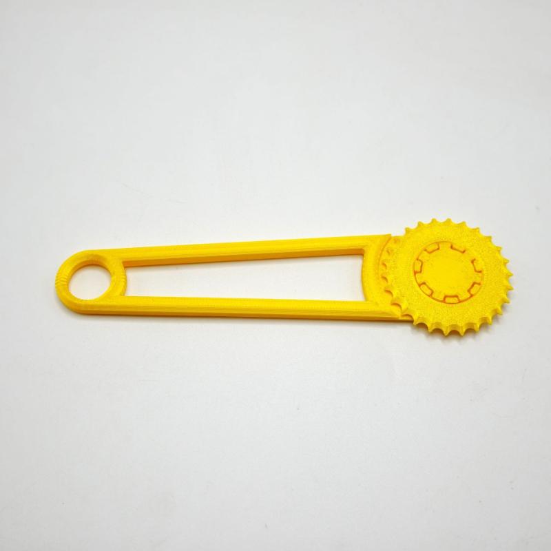 

A Hand Tool for Punching Holes in Household Cardboard Boxes жёлтый