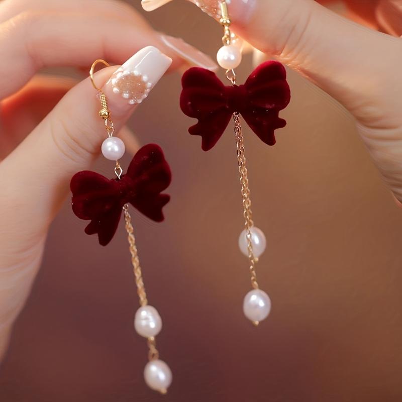 Autumn and Winter New Bow Imitation Pearl Tassel Earrings, Suitable for Women's Holiday Party Accessories and Gifts