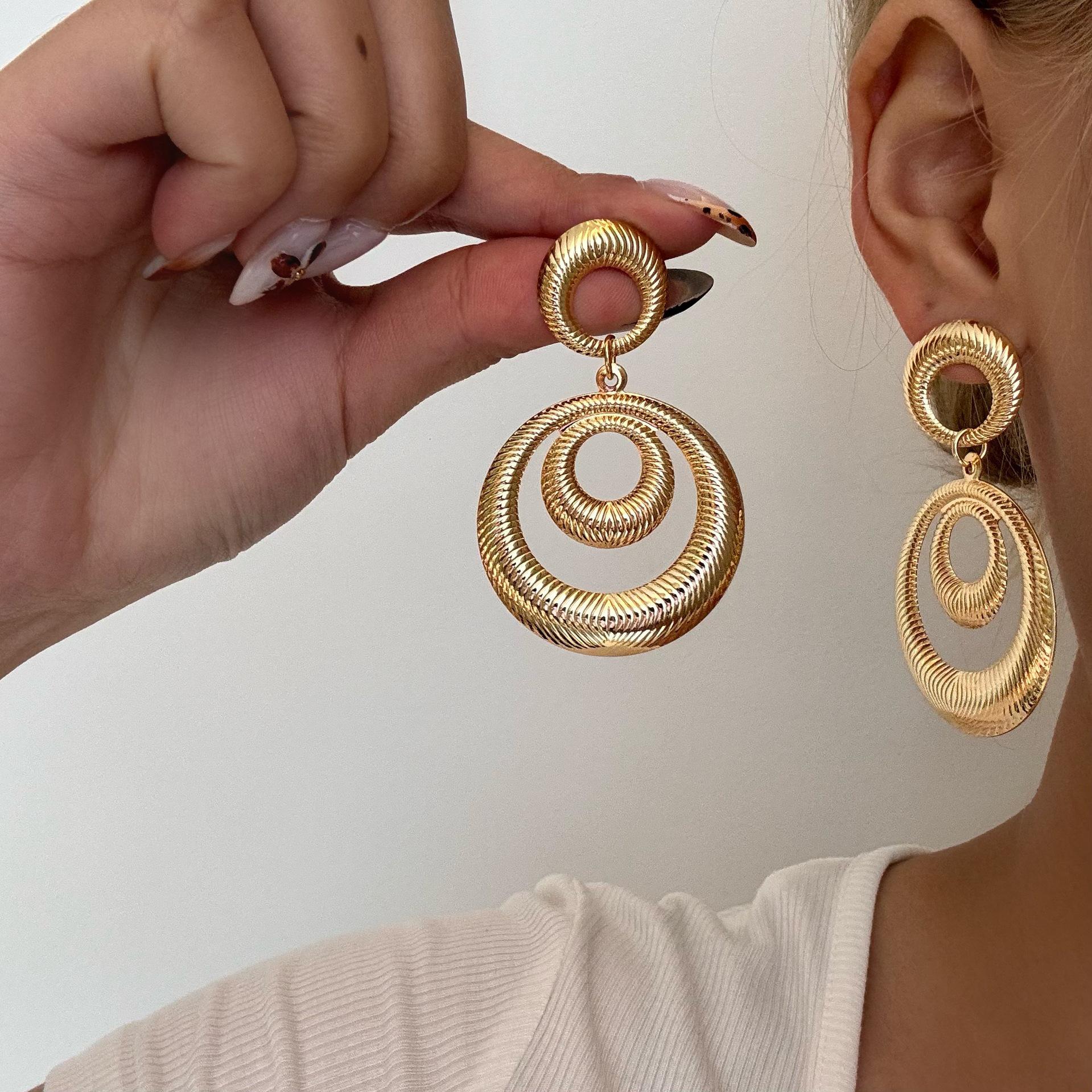 European & American Fashion Hollow Round Metal Earrings with Exaggerated Geometric Drops - INS Style for Women