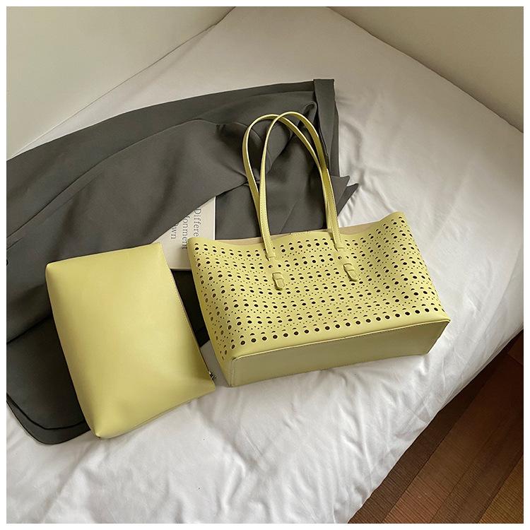 2025 spring and summer new niche high-end hollow tote bag large-capacity temperament commuting single shoulder child and mother bag