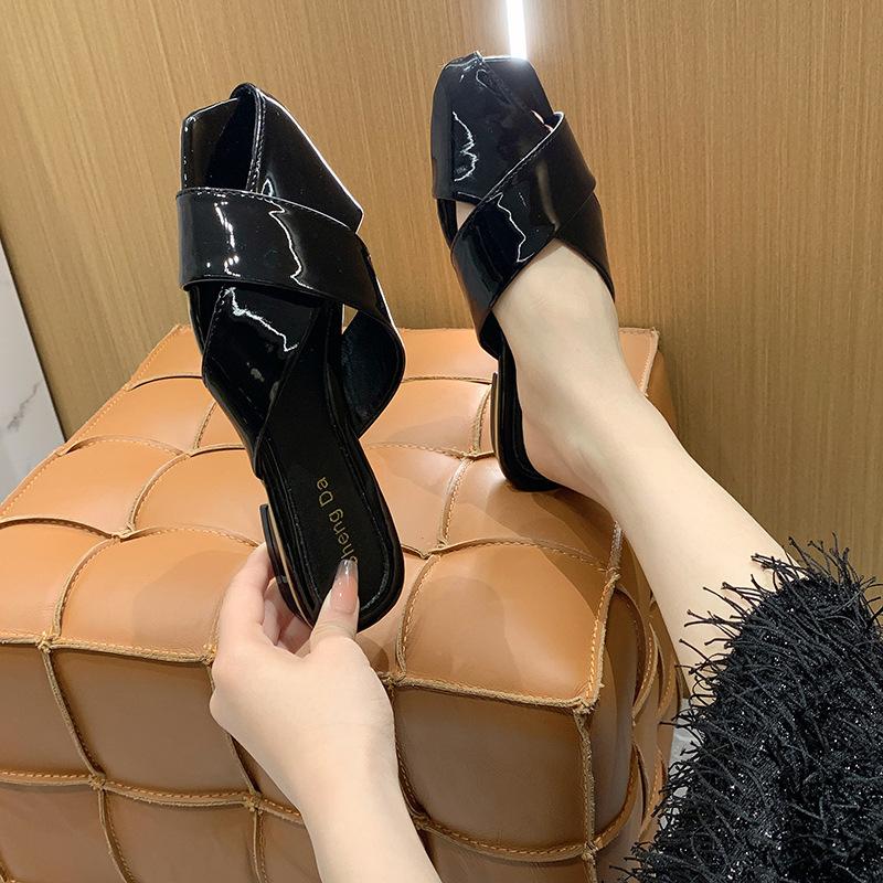 Silver low-heeled baotou half slippers summer wear New Year's new niche beach woven open-toed cool slippers