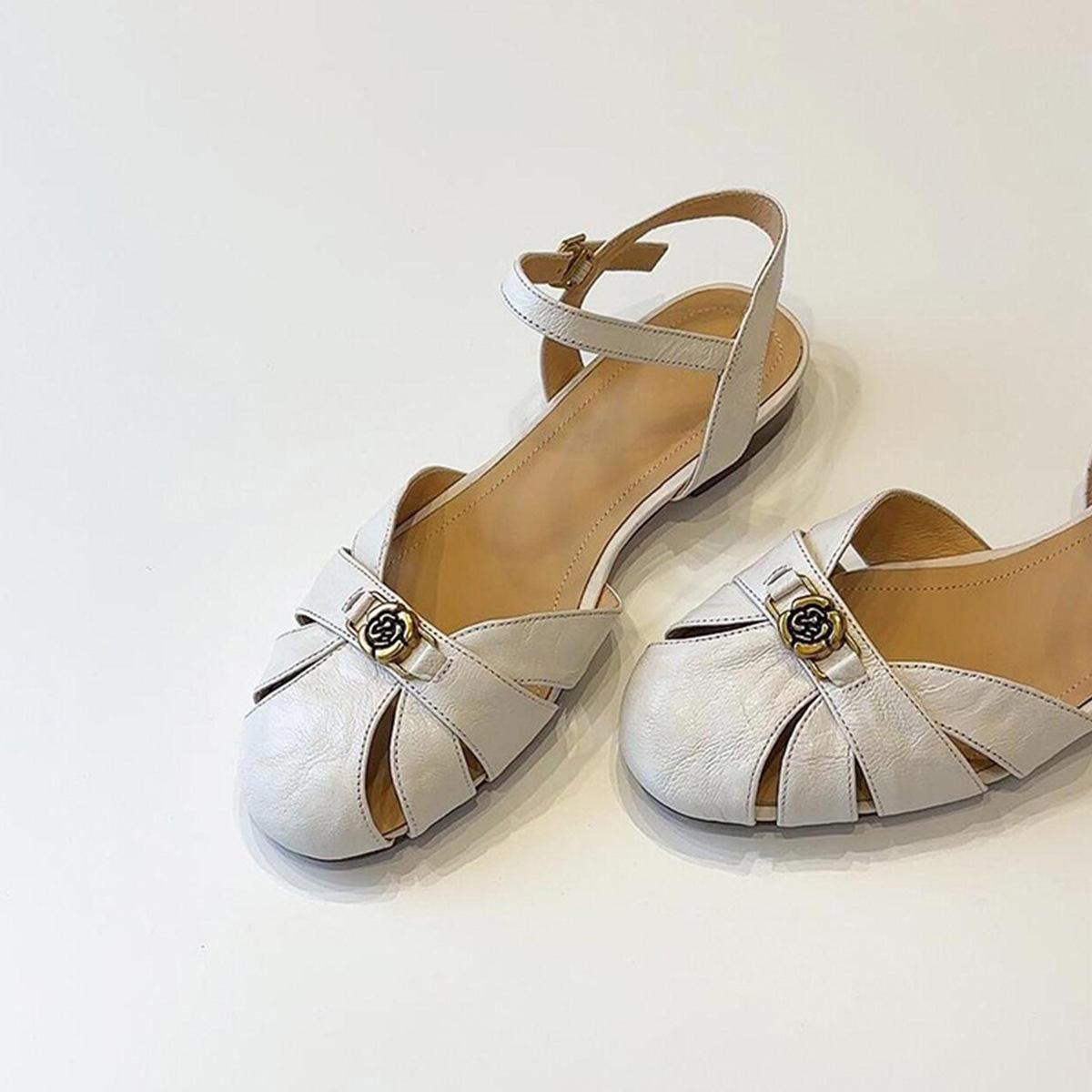 

Soft leather version~ New French hollow one-word sandals women s round head versatile retro camellia Roman shoes 35