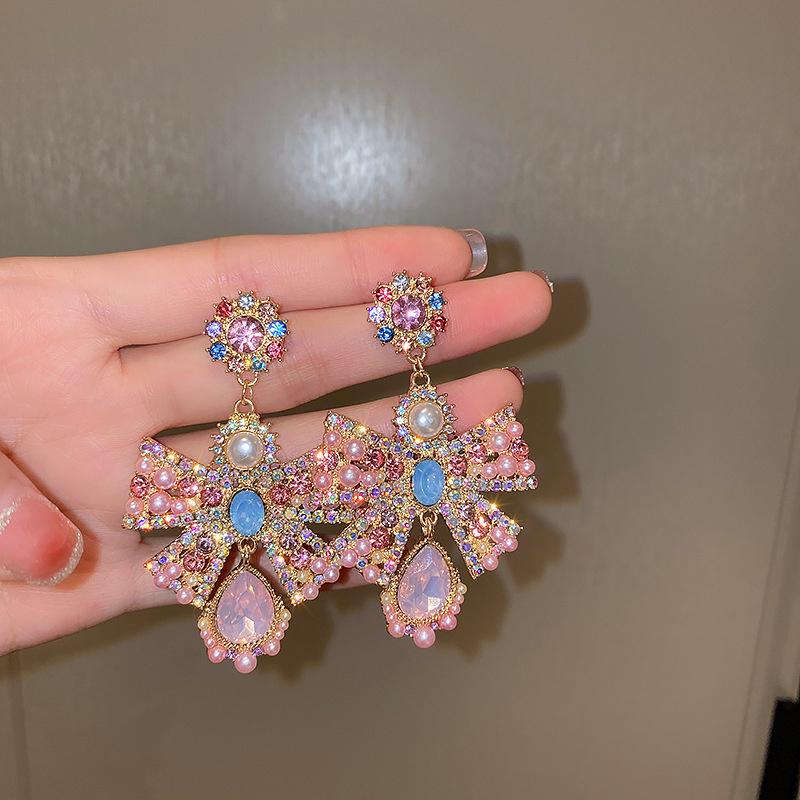 

Винтажные серьги-подвески из розового хрусталя в стиле барокко для женщин, серьги-подвески с цирконом в форме бантика, эффектные серьги с цирконом розовый