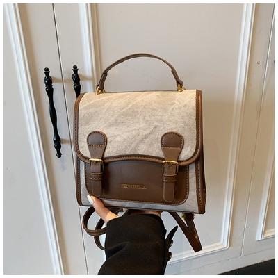 Retro Fashion Backpack Women's Autumn New Student Commuter Small Backpack Premium Sense Oblique Span Women's Bag