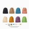 Winter warm knitted hat versatile thick wool twist hat women's ear protection cold solid color hat