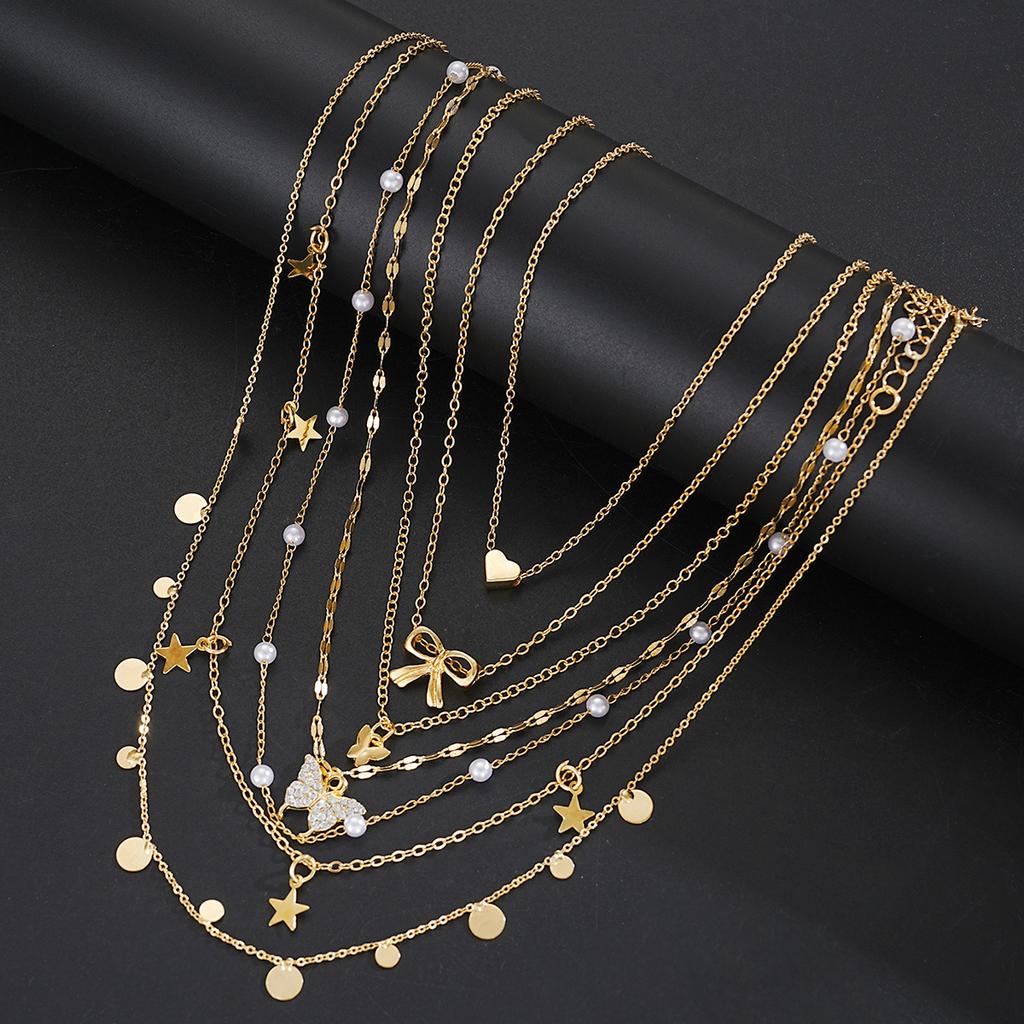 Ensemble de bijoux mode minimaliste 17 pièces pour femmes Collier avec pendentif torsadé vintage os de serpent cœur papillon étoile Bracelets Ensembles Cadeau
