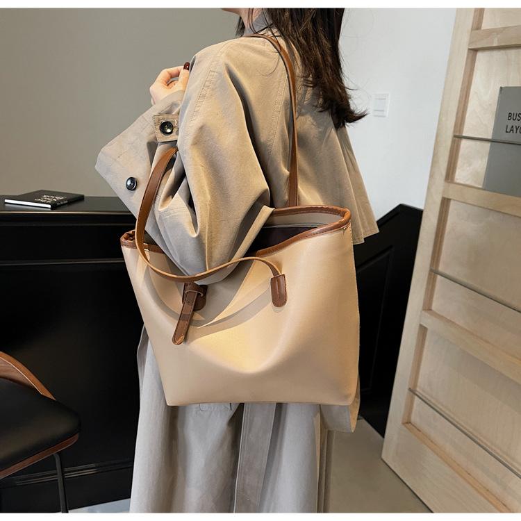 

Large capacity bag 2025 new bag women s senior sense college student class shoulder bag women s portable commuter tote bag хаки