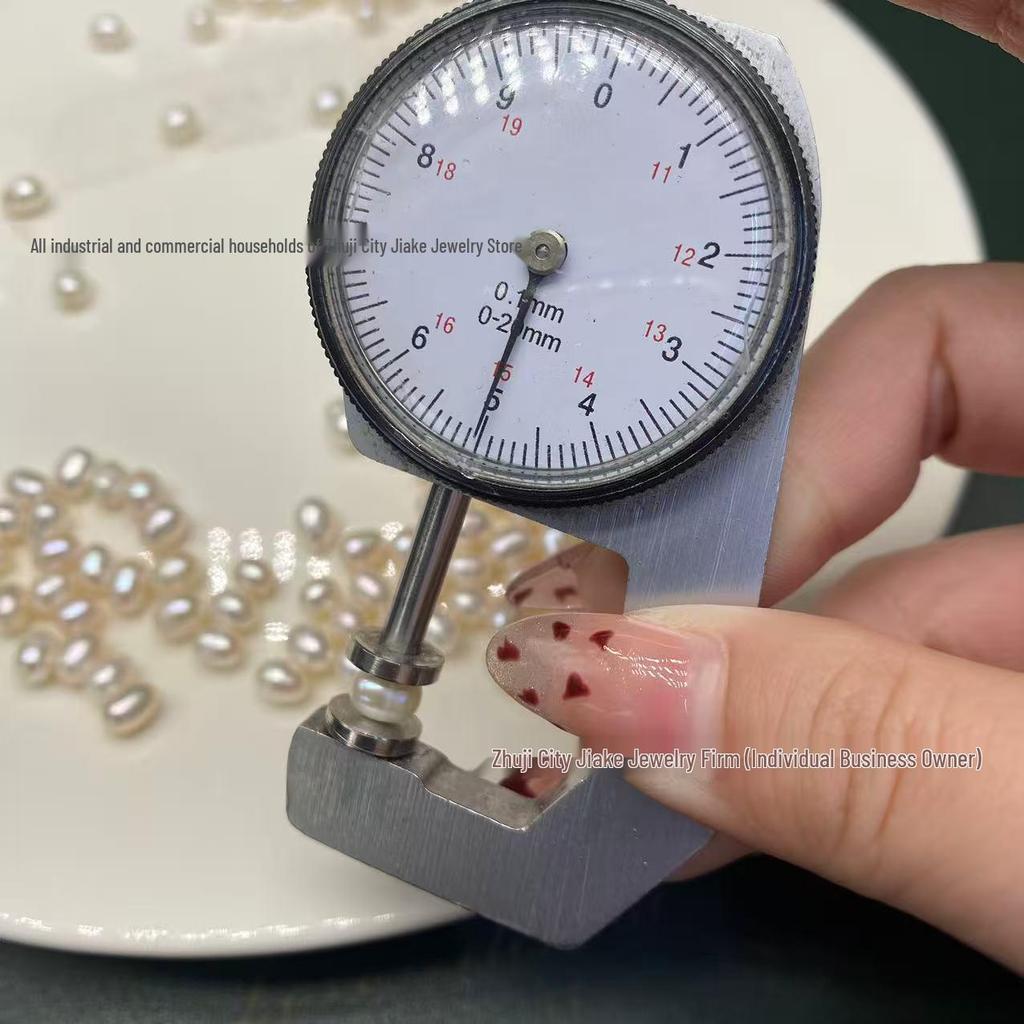 5-6mm Rice-Shaped Freshwater Pearl Beads, Half-Drilled, Strong Luster, with Minor Imperfections, Ideal for DIY Jewelry.