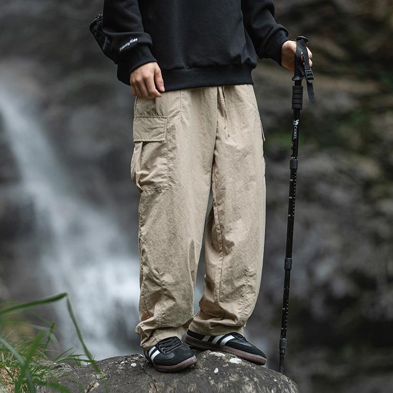Anti-splashing texture slightly wrinkled fabric tooling casual pants spring new loose three-dimensional sticker mountain outdoor trousers q