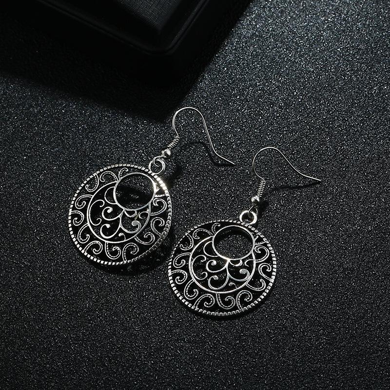 Tibetan Ethnic Earrings: Retro Hollow Pattern from Nepal & Yunnan