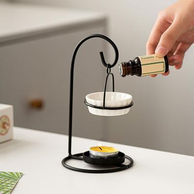 Bruciatore di oli essenziali, diffusore di aromaterapia in ceramica, bruciatore di oli con candela da tè in ferro