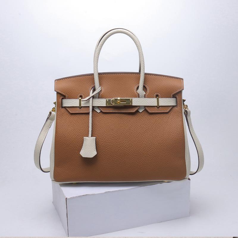 2021 Spring new trendy leather handbag top layer cowhide capacity one-shoulder crossbody hand-carried platinum bag