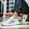 New lk flying weaving men's couple breathable sneakers hollowed out and light casual sports