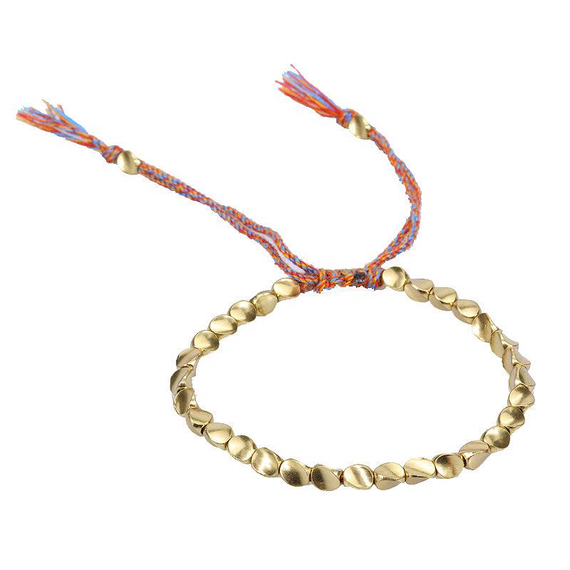 Handmade Woven Bracelet with Irregular Copper Beads and Creative Tassel Drawstring