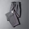 Męskie spodnie casualowe ze ściągaczem w pasie i modnym wzorem Harlan Pants Sportowe luźne spodnie w jednolitym kolorze