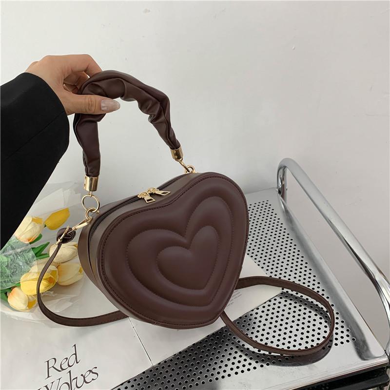 Adorable 2024 Heart Shaped Imprint Handbag For Girls Casual Fashionable Small Bag