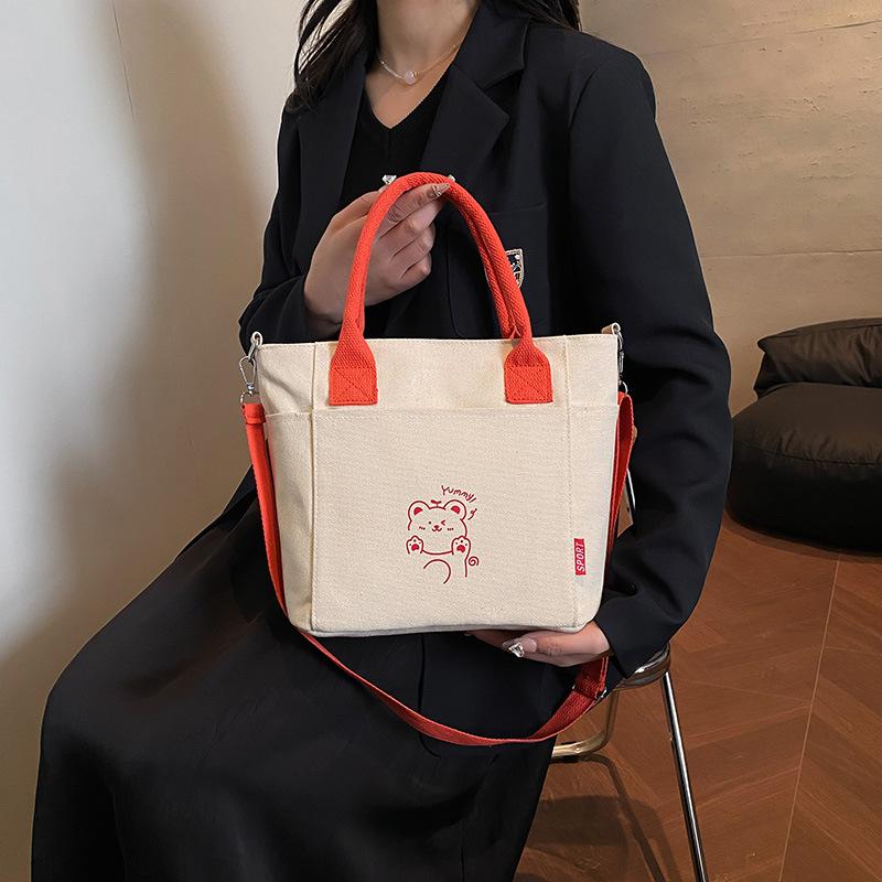 Korean Contrasting Color Portable Canvas Bag Women's 2025 New Casual Messenger Bag Popular Literature Cute Commuter Bag