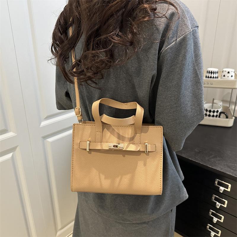 Stor kapacitet sommar vardaglig ny retro mode textur vardaglig bärbar tote crossbody axelväska kvinnor