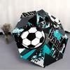 Folding Umbrella The Umbrella Features a Soccer Ball Pattern, Abstract Splashes In Turquoise and Black, and the Text "Football