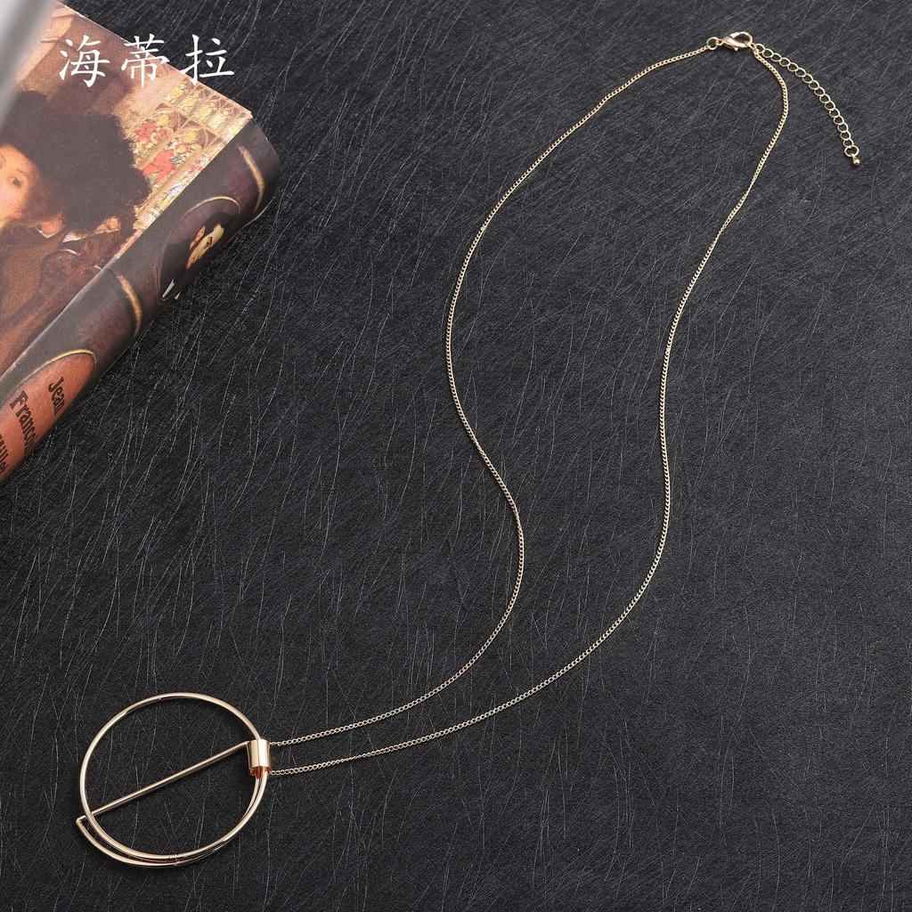 New Gold Hollow Ring Pendant, Fashionable and Simple Women's High-end Long Banquet Sweater Chain