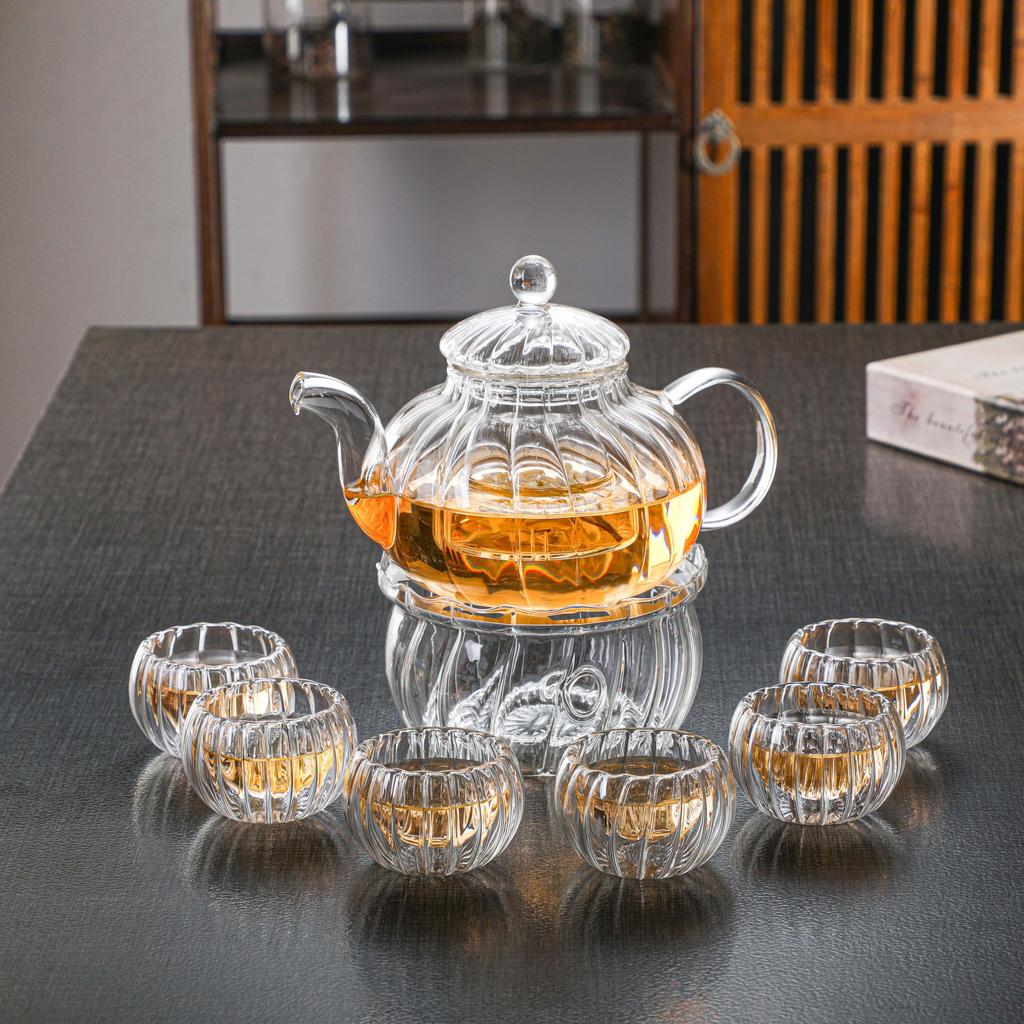 Transparent Pumpkin-Shaped Glass Teapot and Tea Warmer Set, 600ml Capacity, Includes Tea Strainer, Teapot, Pot Warmer, and Candle Holder. Stylish