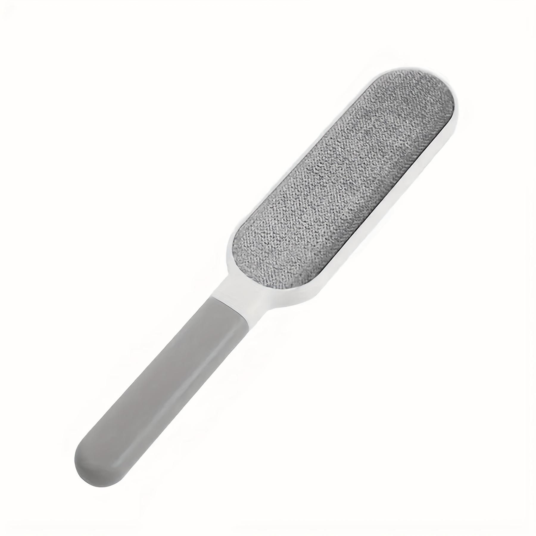 

A multi-functional reusable dust brush, double-sided pet hair remover for cat hair, clothes, sofas, furniture, bedding, carpet
