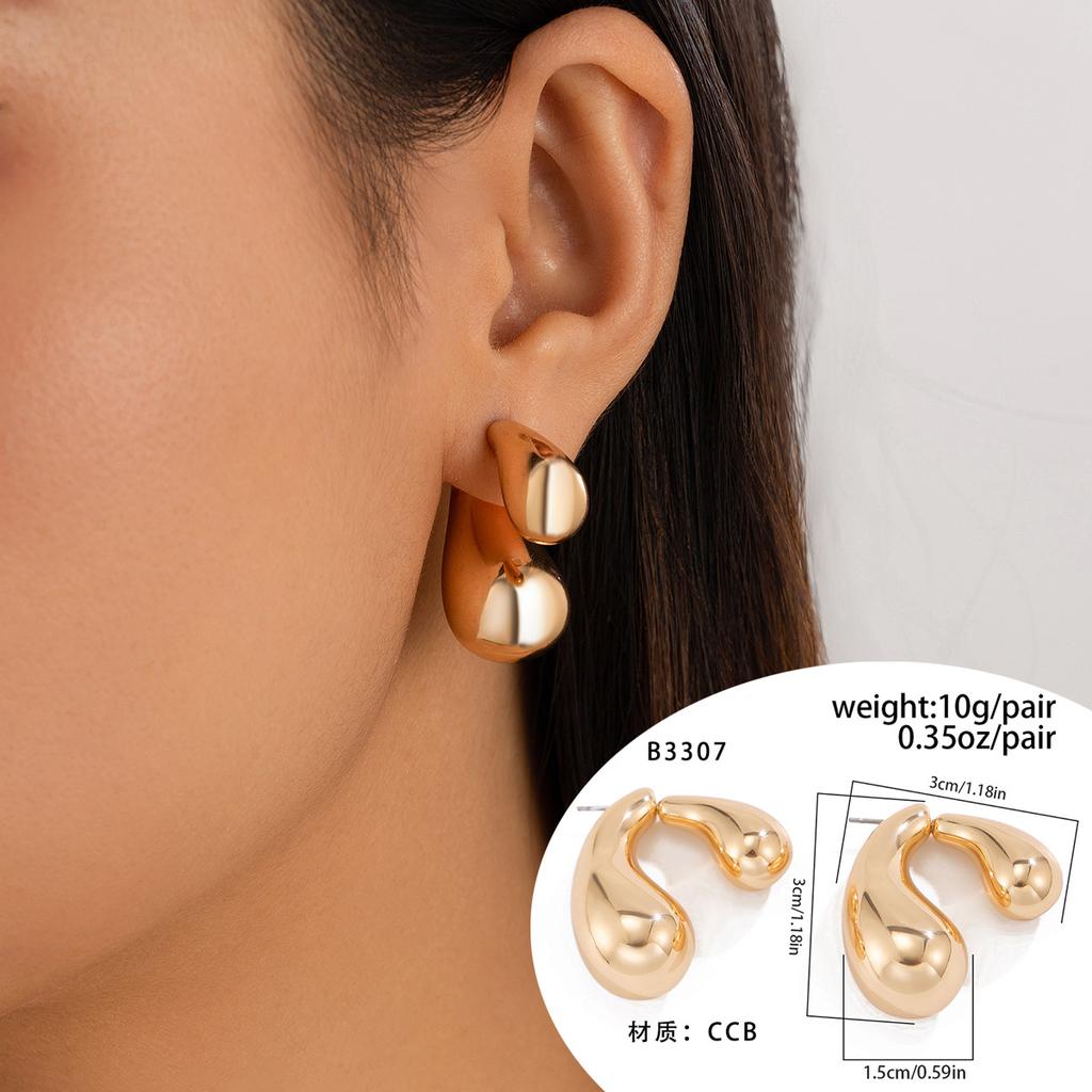 Street shots ins geometric metal earrings earrings design glossy surface comma water drop stud earrings female