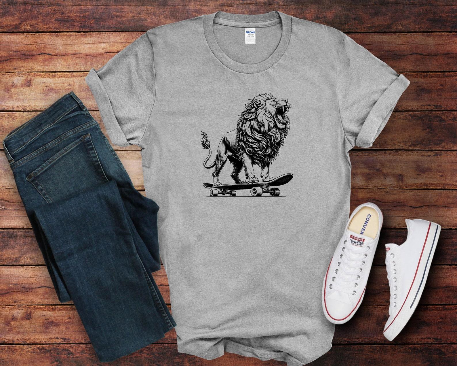 Playful Lion on Skateboard T-Shirt L
