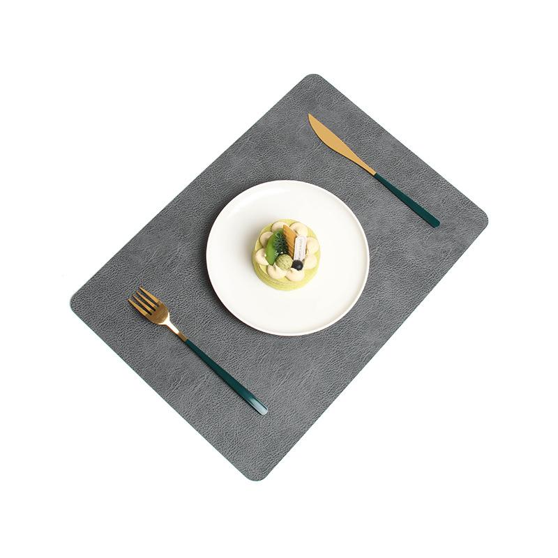 

Leather Dining Mat with Anti Scalding Double-sided Integrated Cowhide Pattern , Hotel and Household Thermal Insulation Mat 1PCS