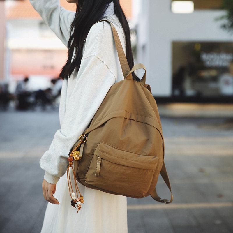 Schoolbag Solid Color Literary and Lightweight Small Backpack Women's Japanese Simple Travel Mountaineering Backpack Folded Texture Small School Bag