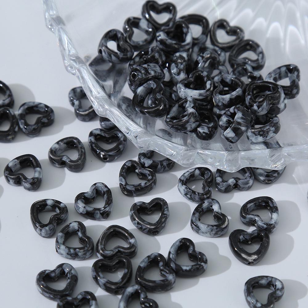 

Черные 3D керамические мультяшные бусины для самодельных украшений ручной работы Hollow heart (5×13mm)