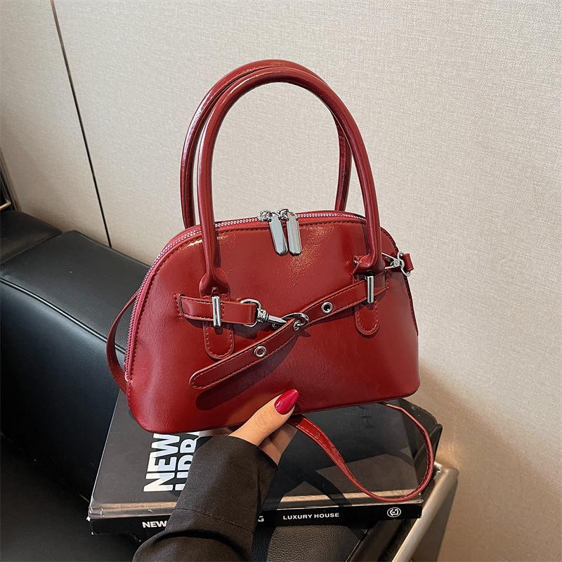 High-End Nischen-Tasche Damen neue vielseitige Umhängetasche Frühling und Sommer tragbare Muscheltasche kleine Tasche