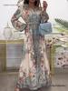 Retro European & American Women's Long Sleeve Spring Dress with Waist-Cinching, Big Hem, and Printed Design.