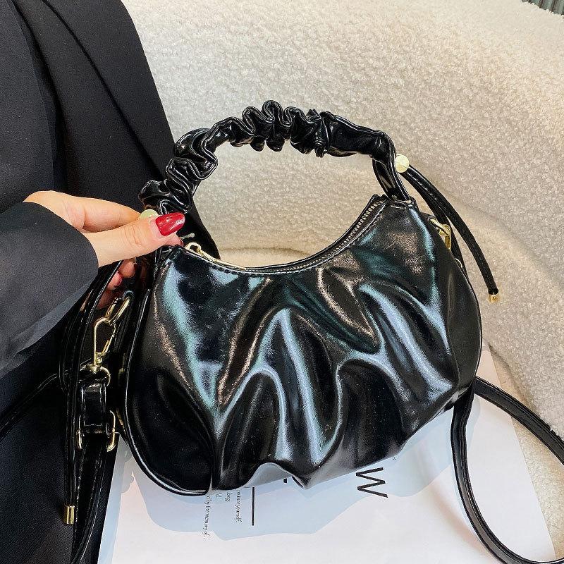 Popular retro Maillard pleated oil wax leather portable cloud bag niche fashion versatile messenger women's bag