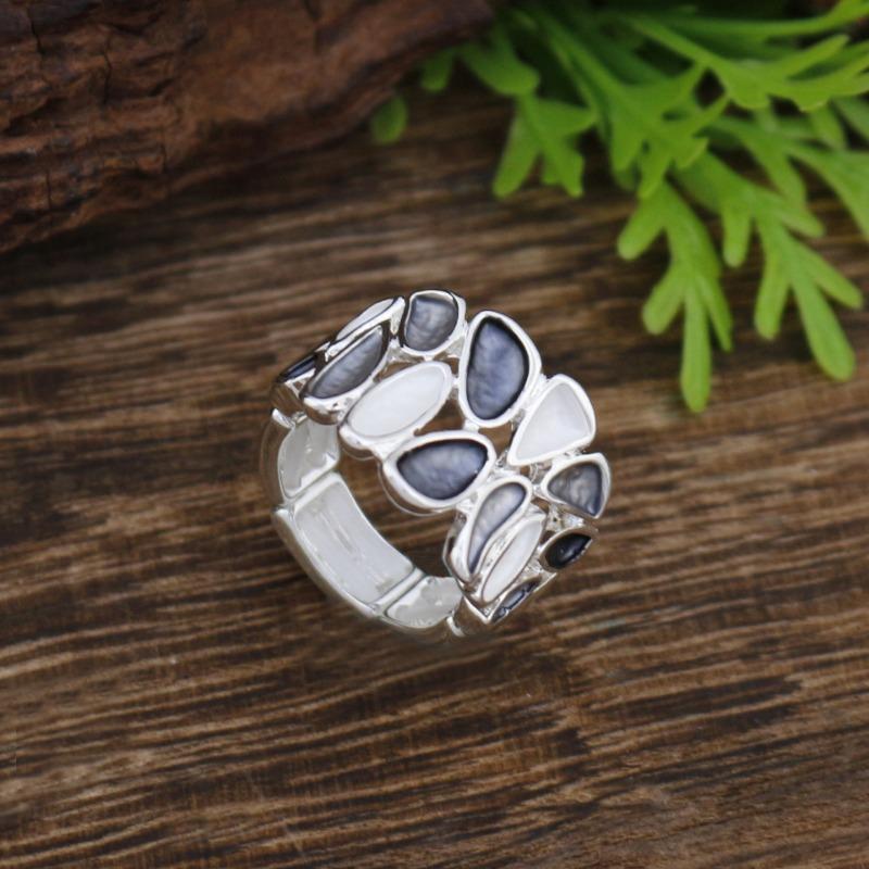 New enamel color hollow geometric petal elastic ring women's simple high-end versatile flower ring