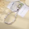 Stylish Floral Pearl Beaded Phone Lanyard for Women – Light Luxury, High-End Feel, Anti-Lost Chain