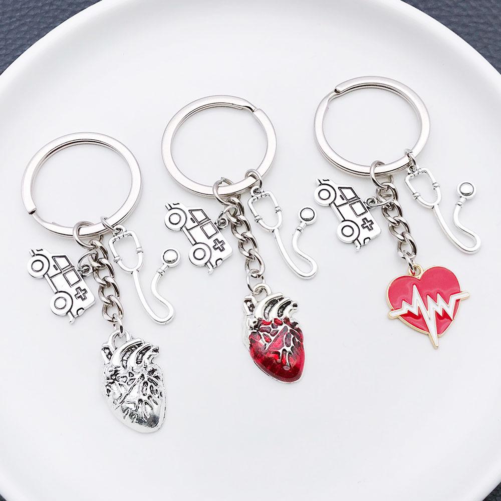 Antique Silver Medical Series Keychain: Syringe, Stethoscope, Heart, Ambulance, and ECG Zinc Alloy Pendant
