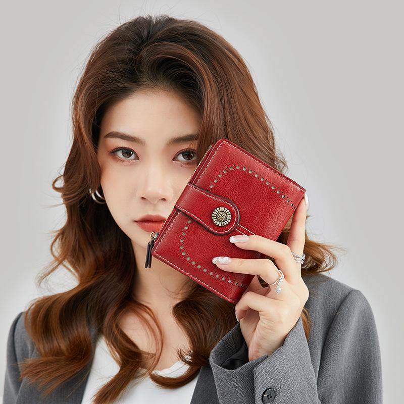 2023 RFID Women's Oil Wax Leather Wallet: Short Card Holder with Coin Purse and Fashion Buckle Zipper.