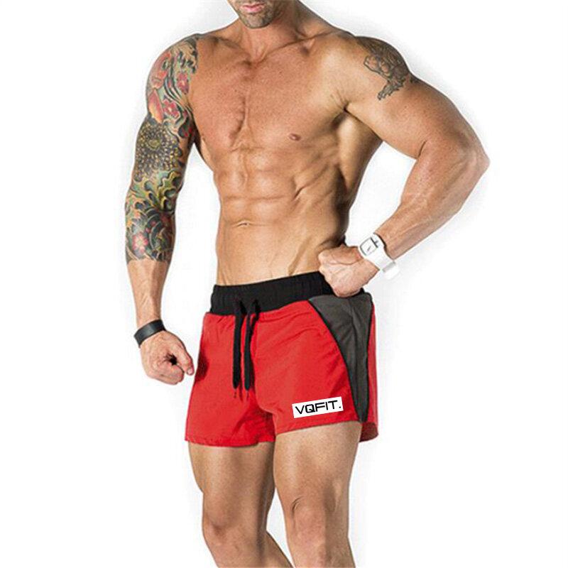 

Muscleguys Мужские спортивные шорты Летние повседневные пляжные шорты-бермуды Мужские спортивные короткие спортивные штаны для бодибилдинга Шорты сухой посадки Одежда для фитнеса XL красный