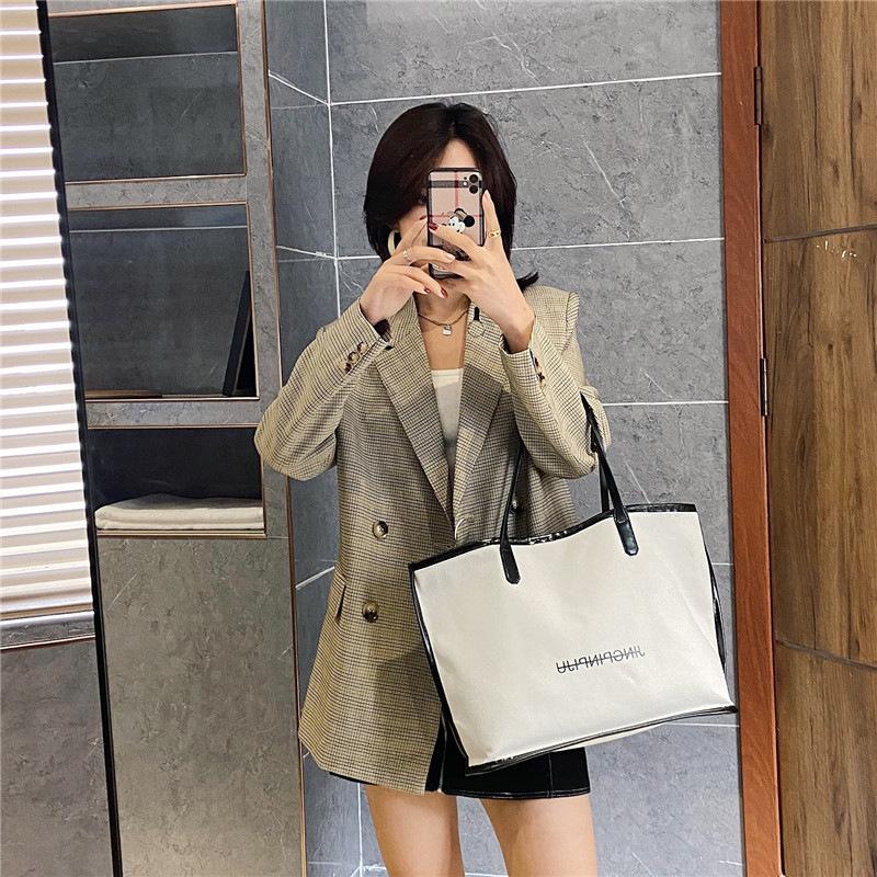 The Small and Fresh Large-capacity Handbag Is Simple and Open