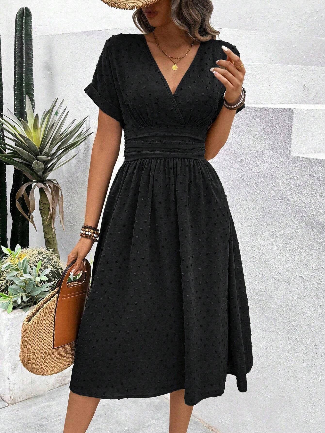 Spot independent station European and American women s clothing V-neck fashion medium hairball elegant European and American style dress women S