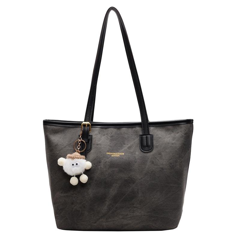 Niche high-end design tote bag large-capacity commuting leisure texture shoulder messenger bag pendant bag