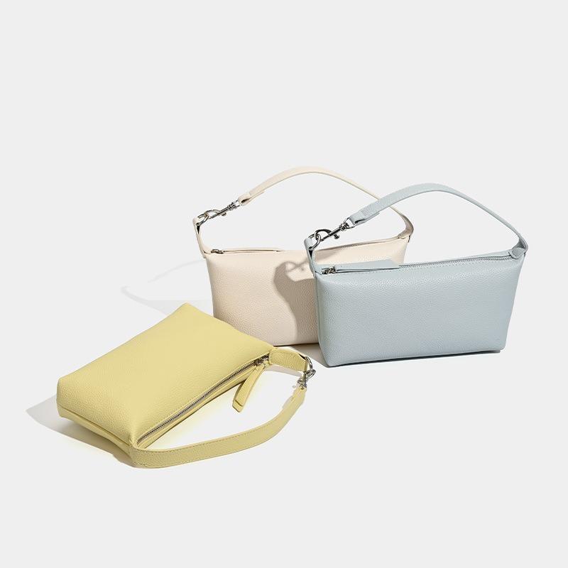 Spring new simple and versatile shoulder messenger bag PU texture pillow bag versatile commuter armpit bag