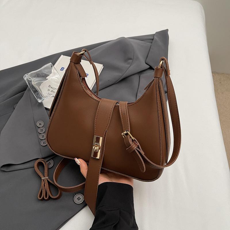 

Відпочинок, модна проста атмосфера, персоналізована сумка в формі півмісяця, модна сумка через плече 2024, модна нова портативна жіноча сумка для ніші темно-коричневого кольору