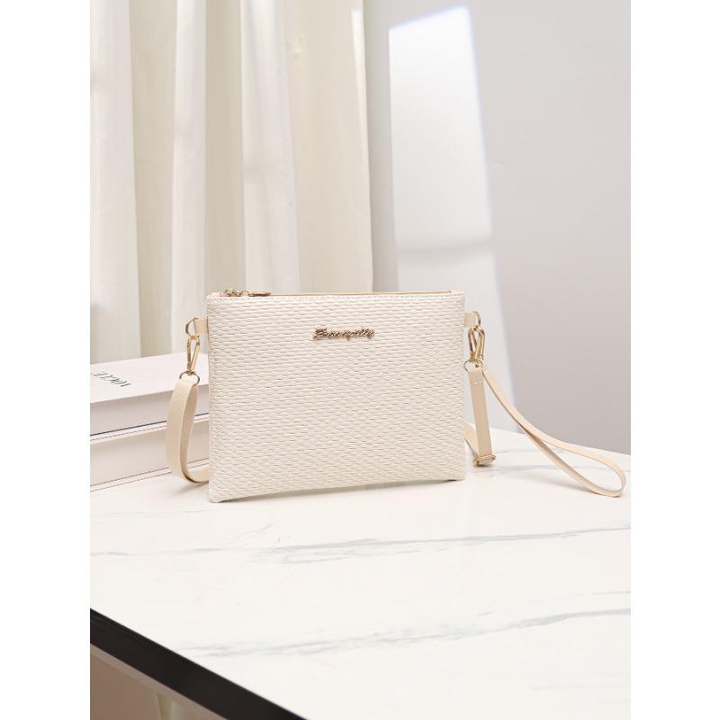 

Women s bag, letter label camera bag, summer and autumn new personalized single shoulder oblique span change small bag.