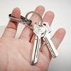 Keychain Multi-tool Compact Multifunctional Keychain Gadget Portable Tool with Screwdriver Bottle Opener Outdoor Emergency Tool